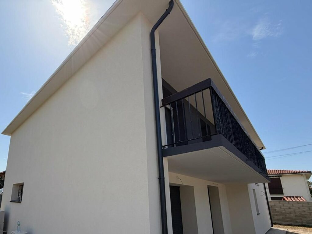 Façade terminée après isolation par l'extérieur en PSE graphite, Villeneuve-Tolosane