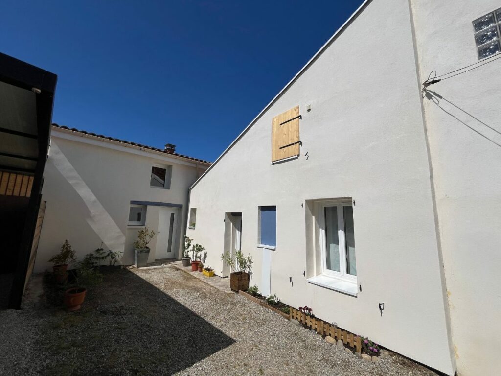 Roquettes, 39 m² : Façade, isolation par l'extérieur, après travaux