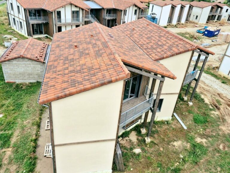 Logements participatifs, 2 000 m² : Façade, isolation par l'extérieur, après travaux